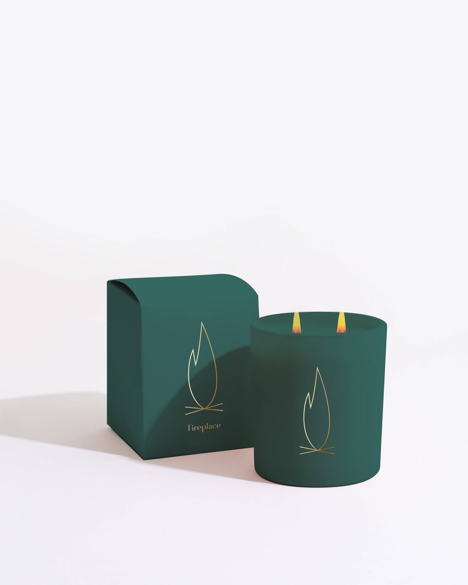 Fireplace Minimalist candle in glass jar with bold evergreen color and box by Brooklyn Candle Studio