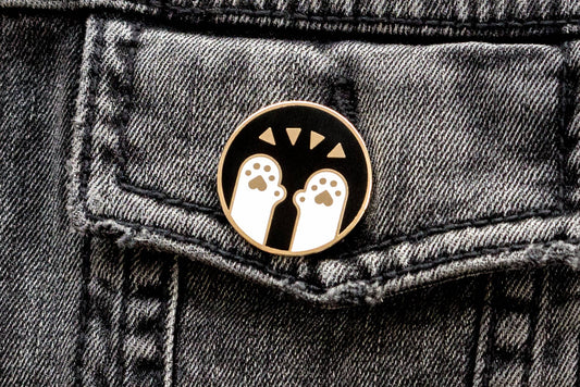 High five with cat paws in the Pawsome Pin