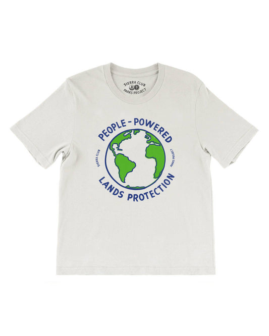 White shirt with earth that reads People Powered lands protection by Parks Project + Sierra Club
